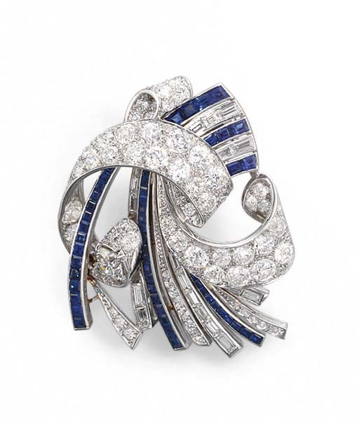 AN ART DECO DIAMOND AND SAPPHIRE BROOCH