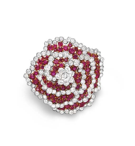 A RUBY AND DIAMOND FLOWER BROOCH
