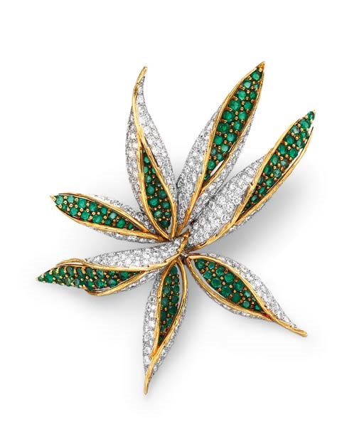 AN EMERALD AND DIAMOND BROOCH