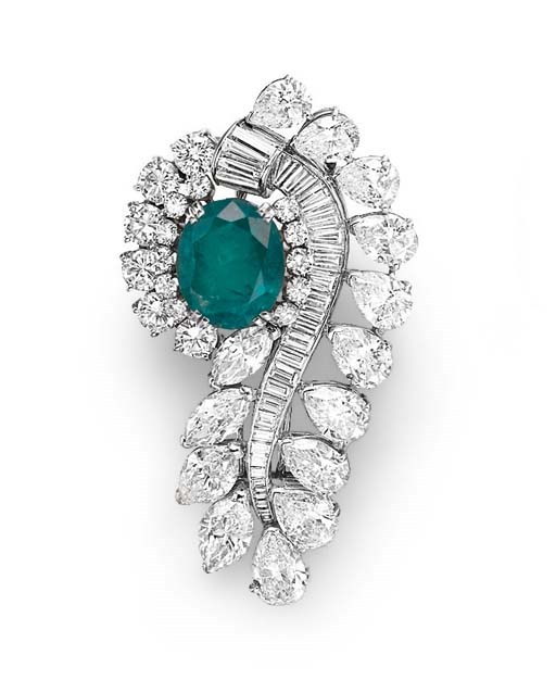 AN EMERALD AND DIAMOND BROOCH, BY HARRY WINSTON