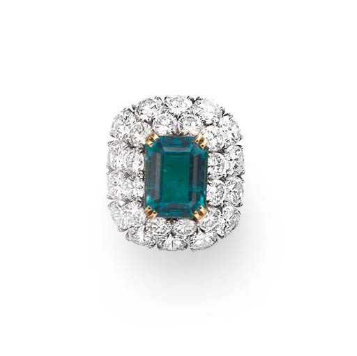 AN EMERALD AND DIAMOND RING, BY HARRY WINSTON
