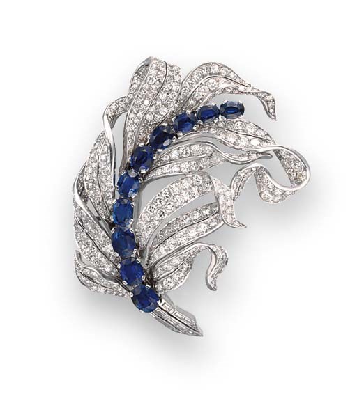 A SAPPHIRE AND DIAMOND FEATHER BROOCH