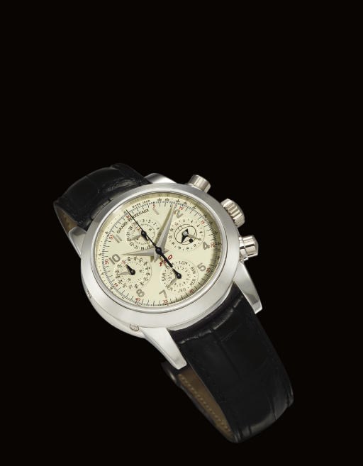 GIRARD-PERREGAUX. A PLATINUM AUTOMATIC PERPETUAL CALENDAR CHRONOGRAPH WRISTWATCH WITH 24 HOUR AND DAY AND NIGHT INDICATION