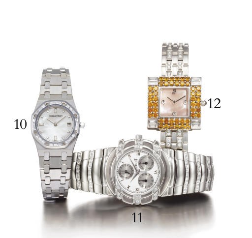 AUDEMARS PIGUET. A LADY'S 18K WHITE GOLD AND DIAMOND-SET TONNEAU-SHAPED WRISTWATCH WITH DATE, BRACELET AND MOTHER-OF-PEARL DIAL