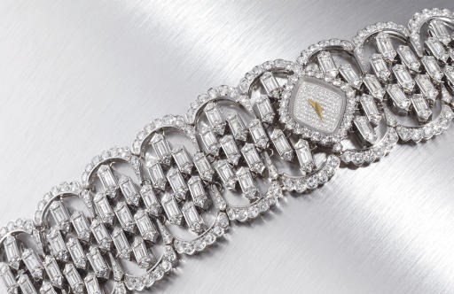 ETOILE. A LADY'S 18K WHITE GOLD AND DIAMOND-SET BRACELET WRISTWATCH