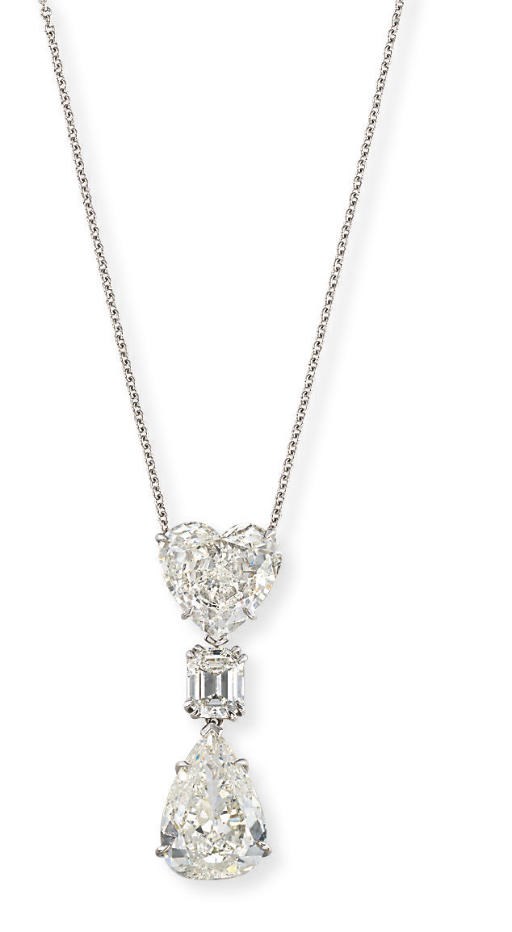A DIAMOND THREE-STONE PENDANT