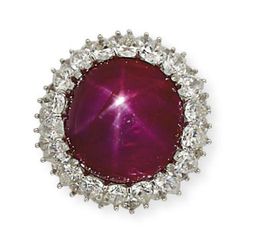 A RARE AND IMPRESSIVE STAR RUBY AND DIAMOND RING