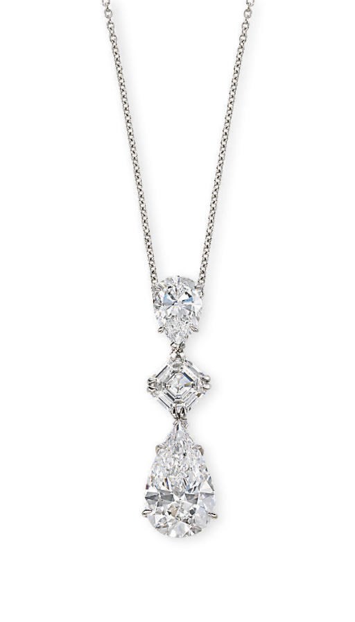 AN IMPORTANT DIAMOND THREE-STONE PENDANT