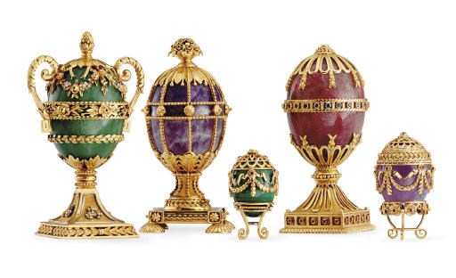 A GROUP OF FIVE CONTINENTAL GOLD-MOUNTED AND GEM-SET HARDSTONE EGGS
