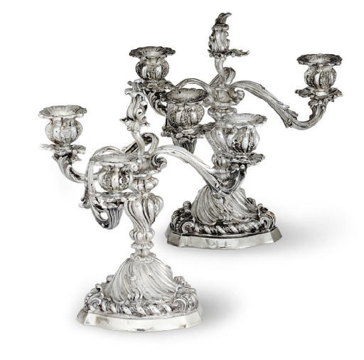A PAIR OF ITALIAN SILVER THREE-LIGHT CANDELABRA