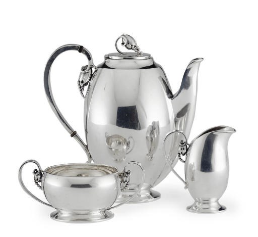 A DANISH SILVER THREE-PIECE COFFEE SERVICE