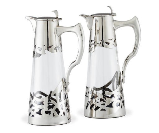 A PAIR OF AUSTRIAN SILVER-MOUNTED GLASS CLARET JUGS