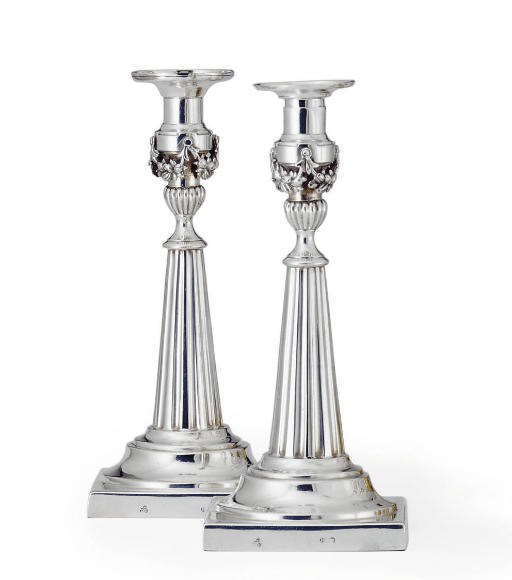 A PAIR OF GERMAN SILVER CANDLESTICKS
