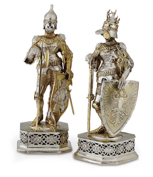 A PAIR OF GERMAN SILVER AND IVORY KNIGHTS**