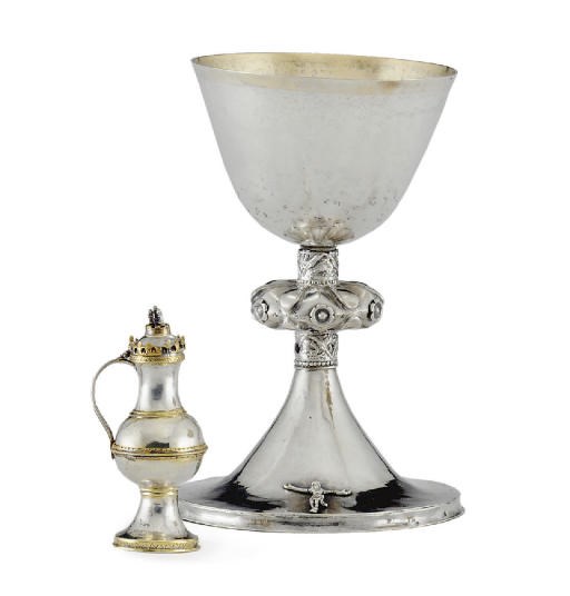 A CONTINENTAL PARCEL-GILT MINIATURE FLAGON