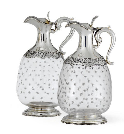 TWO VICTORIAN SILVER-MOUNTED GLASS CLARET JUGS