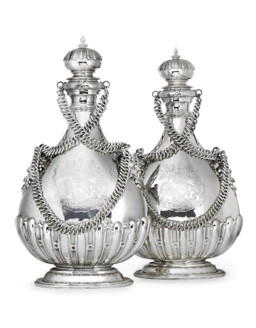 A PAIR OF GEORGE V SILVER PILGRIM FLASKS