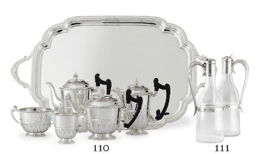 AN EDWARD VII SILVER FIVE-PIECE TEA AND COFFEE SERVICE WITH TRAY