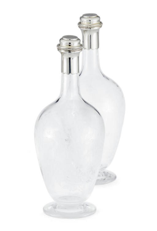 A PAIR OF VICTORIAN SILVER-MOUNTED GLASS DECANTERS