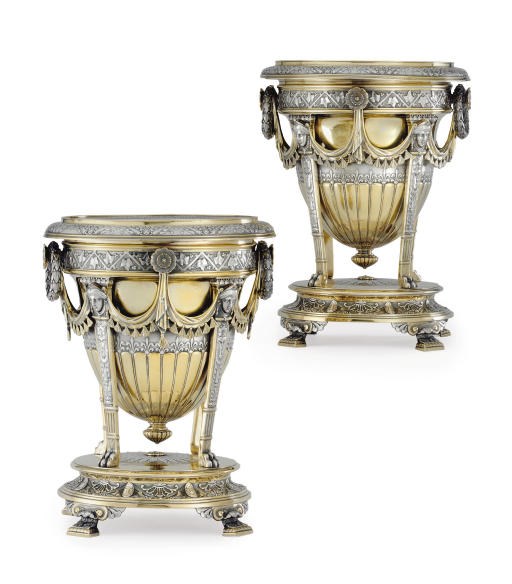 A FINE PAIR OF VICTORIAN PARCEL-GILT SILVER WINE COOLERS