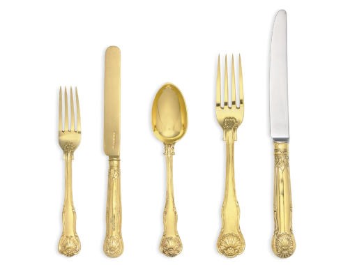A VICTORIAN SILVER-GILT TABLE SERVICE