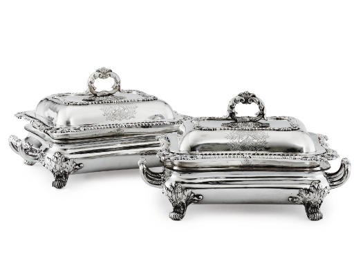 A PAIR OF REGENCY SILVER ENTREE DISHES AND COVERS WITH SHEFFIELD-PLATED STANDS