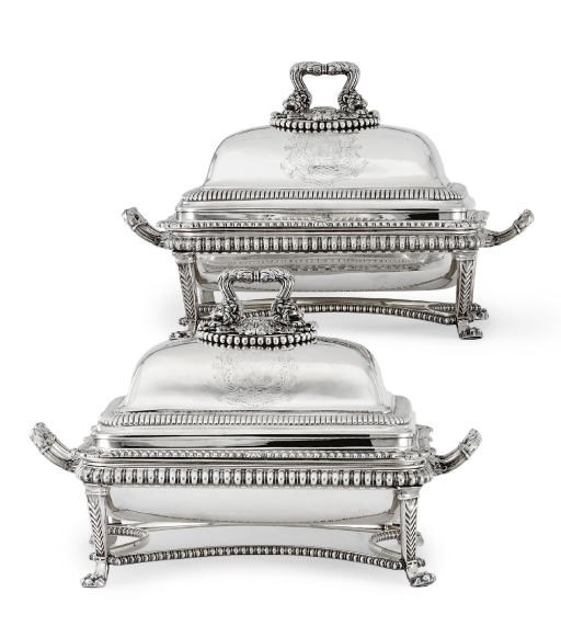 A PAIR OF GEORGE III SILVER COVERED ENTREE DISHES AND SHEFFIELD-PLATED WARMING STANDS
