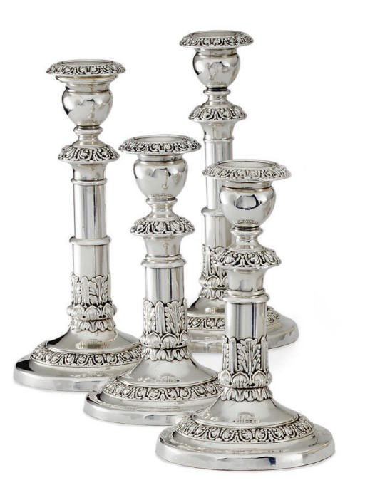 A SET OF FOUR GEORGE IV SHEFFIELD-PLATED TELESCOPIC CANDLESTICKS
