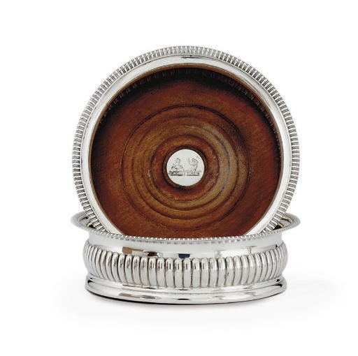 A PAIR OF GEORGE III SILVER WINE COASTERS