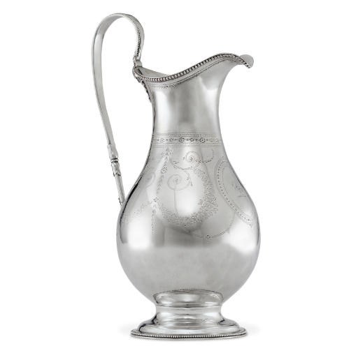 A GEORGE III SILVER WATER JUG