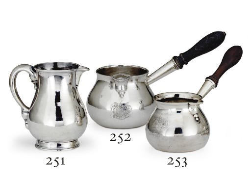 A GEORGE II SILVER WATER JUG