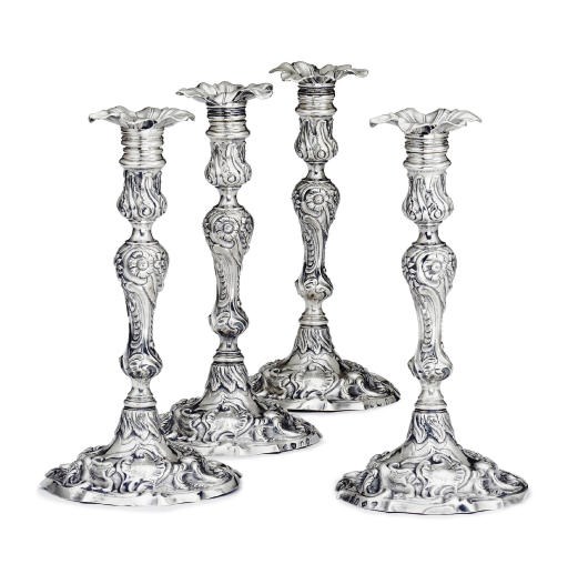 A SET OF FOUR GEORGE II SILVER CANDLESTICKS