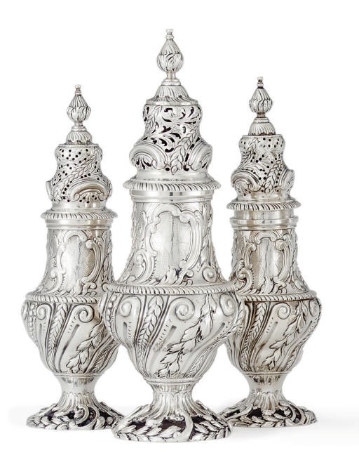 A SET OF THREE GEORGE II SILVER CASTERS