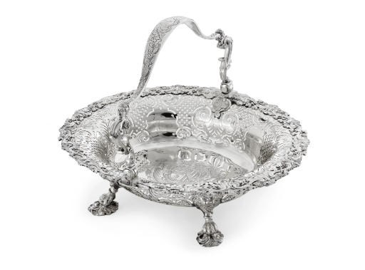 A GEORGE II SILVER CAKE BASKET