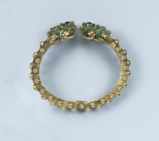 AN ENAMEL AND RUBY FROG BANGLE, BY DAVID WEBB