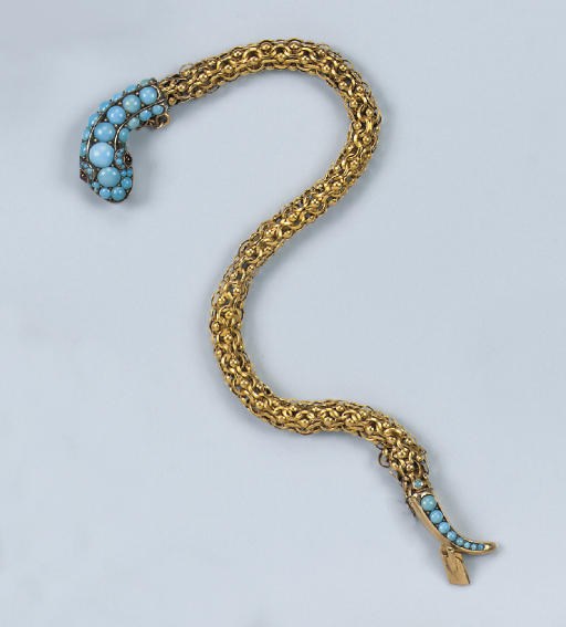 AN ANTIQUE TURQUOISE SNAKE BRACELET