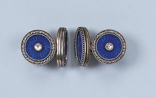 A PAIR OF ENAMEL AND DIAMOND CUFF LINKS
