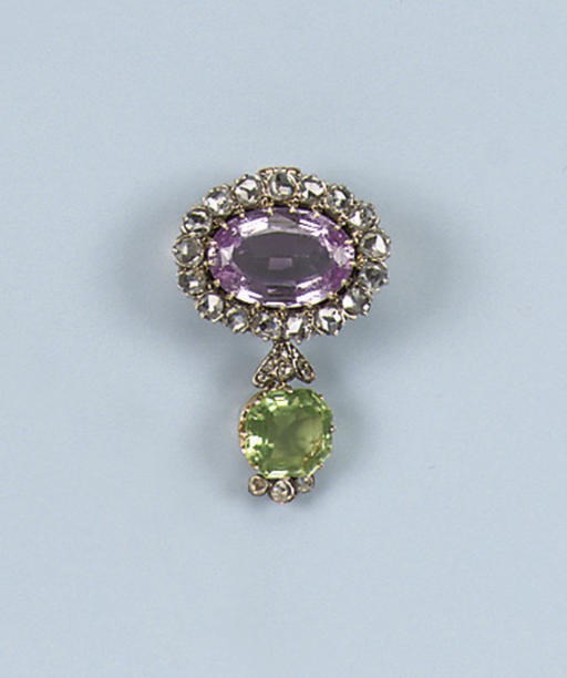 AN ANTIQUE TOPAZ, PERIDOT AND ROSE-CUT DIAMOND BROOCH