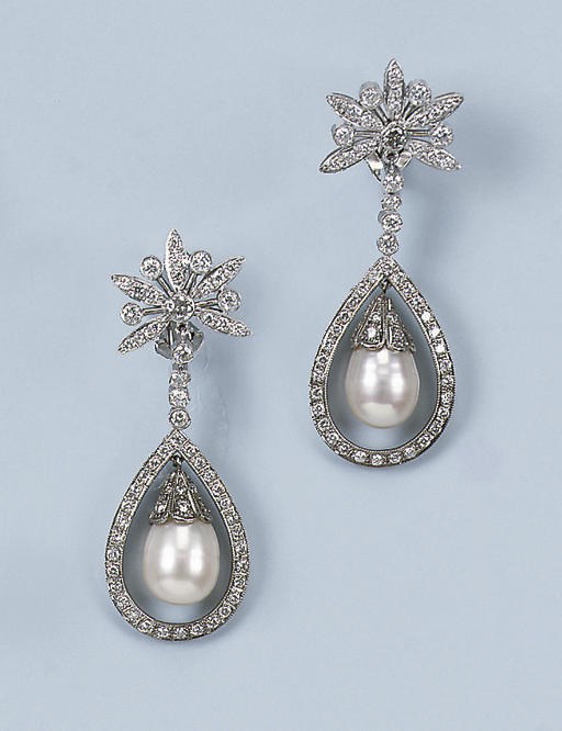 A PAIR OF CULTURED PEARL AND DIAMOND EARRINGS