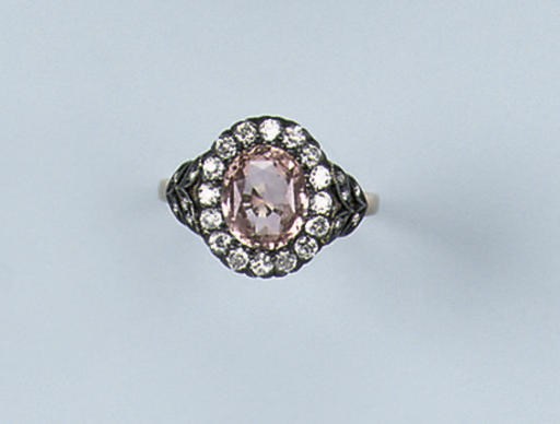 A PINK SAPPHIRE AND DIAMOND RING