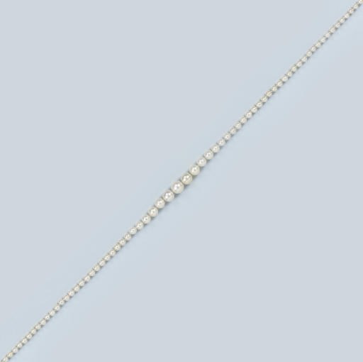 A NATURAL PEARL NECKLACE ON DIAMOND CLASP