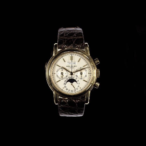 A FINE 18K GOLD PERPETUAL CALENDAR CHRONOGRAPH WRISTWATCH WITH PHASES OF THE MOON, BY PATEK PHILIPPE