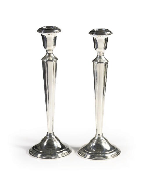 A PAIR OF SILVER CANDLESTICKS, BY CARTIER