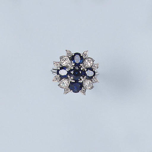 A SAPPHIRE AND DIAMOND DRESS RING, BY KERN