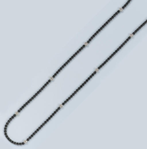 A DIAMOND AND BLACK DIAMOND NECKLACE