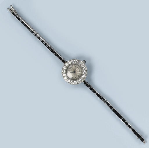 AN ART DECO ONYX AND DIAMOND WRISTWATCH, BY GÜBELIN
