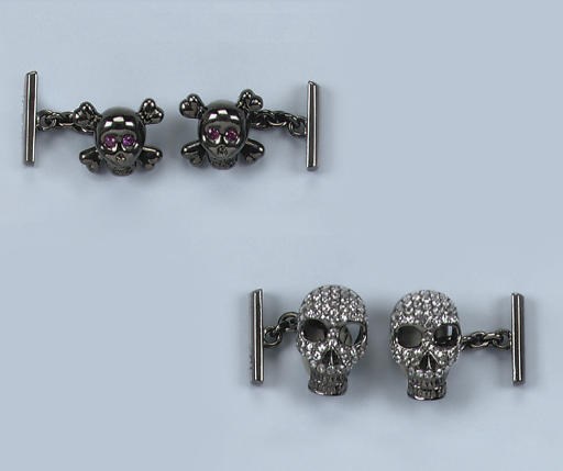 TWO PAIRS OF DIAMOND SKULL CUFF LINKS