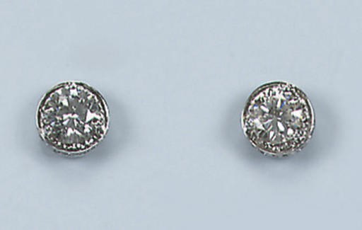 A PAIR OF DIAMOND EARRINGS
