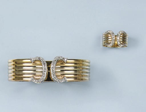 A DIAMOND BANGLE AND RING, BY CARTIER