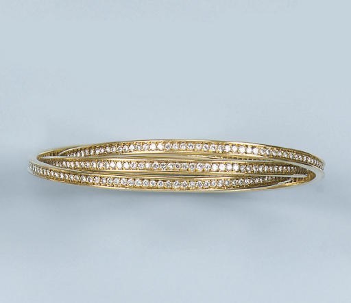 A DIAMOND BANGLE, BY CARTIER